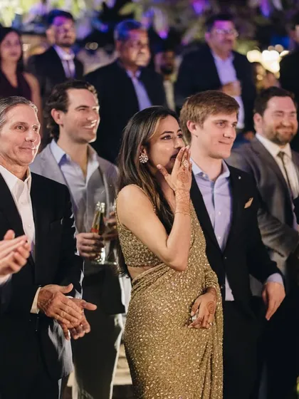 A candid shot of a client enjoying her cocktail party. My job is to make sure you not only look amazing but also feel comfortable enough to live in the moment and enjoy your celebration.