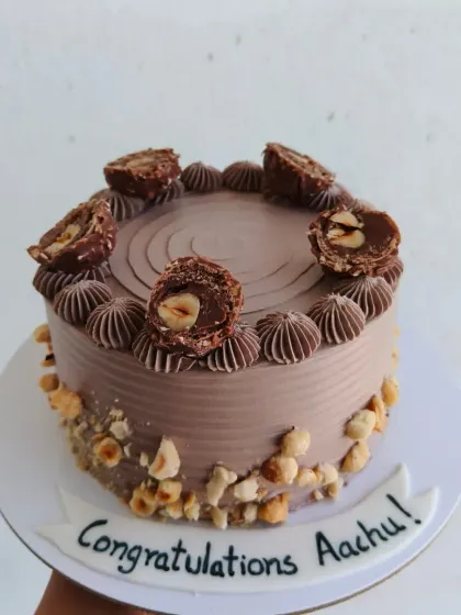 A rich chocolate cake topped with Ferrero Rocher chocolates and crunchy hazelnuts.