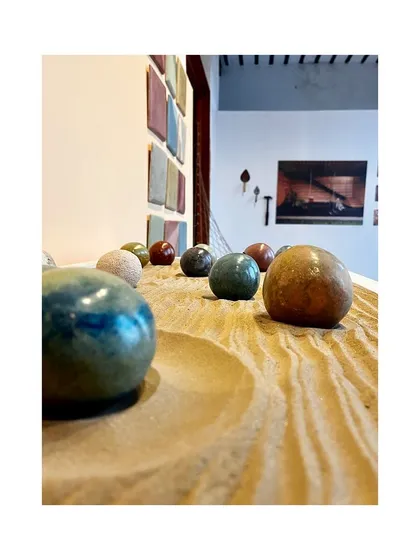 A close-up of the Tadelakt spheres at our IAADB exhibit. This waterproof and decorative plaster has a beautiful, smooth finish that is wonderful to touch.