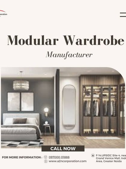 A modular wardrobe with glass-paneled doors and a dark frame, designed as a stylish walk-in or standalone feature for a modern bedroom. The internal lighting highlights the organized clothing and adds a touch of luxury.