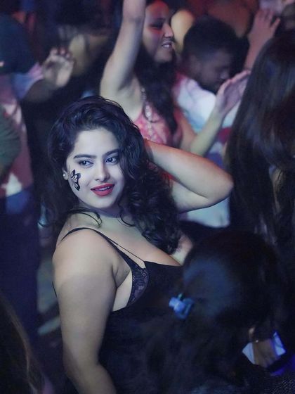 A guest enjoying the music with some creative face paint. Themed nights are always a hit.