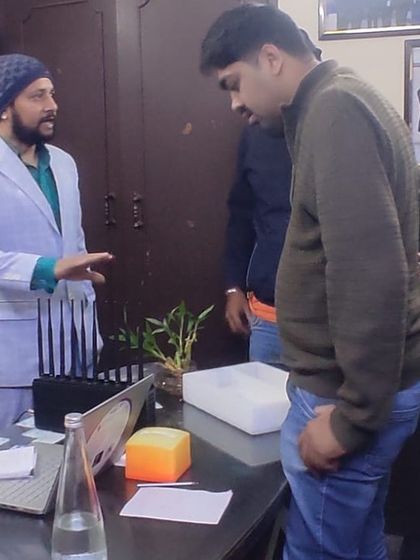 We take the time to explain how our security products work. Here, a client is getting a hands-on look at a signal jammer before making a purchase.