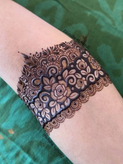 Another angle of this detailed rose armband, showing the precision and artistry of the design.