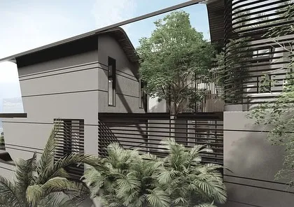 A detail view of the shifting volumes and screened enclosures of the Dona Paula homes. The design uses horizontal louvers and lush, tropical planting to provide privacy and passive cooling while maintaining a lightweight, modern aesthetic.