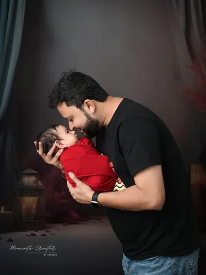 A father's gentle gaze. This close-up shot captures the tender connection between a dad and his newborn, a quiet moment filled with unspoken love.