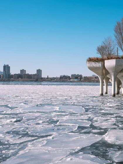 A minimalist shot of the ice-covered Hudson River next to the edge of Little Island park. The clean lines and cold tones give this a very graphic quality.