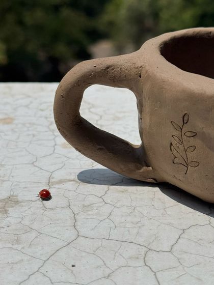 Even the smallest creatures, like this little ladybug that visited our pottery session, remind us to slow down and appreciate the beauty in the details. Nature is our greatest teacher.