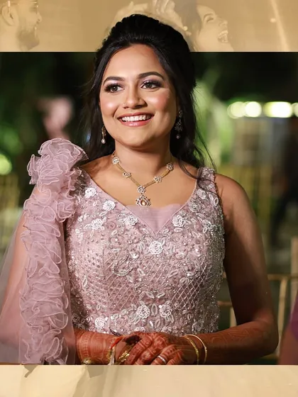 A candid shot of the bride's reception look. Her smile is radiant, and the lavender-themed outfit with its ruffled dupatta is absolutely breathtaking.