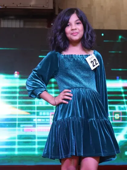 A photo from a previous ramp walk, submitted as part of this contestant's audition portfolio.