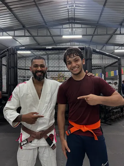 Progress is everything. We celebrate every step of the journey, like Almeer earning his orange belt here. At Reign MMA, your hard work on the mats is recognized and rewarded as you move up the ranks.