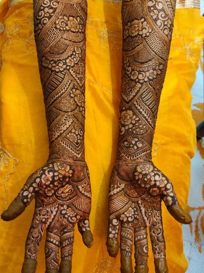 The final result of the design inspired by Arman Asar, a full-coverage bridal look with intricate, flowing patterns.