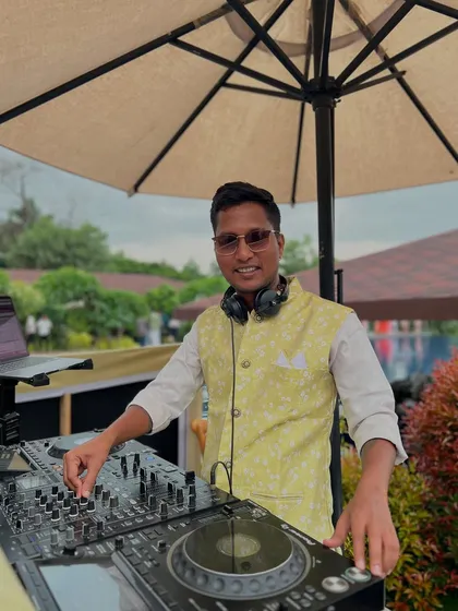 In my element at a destination wedding. Dressed for the occasion, I'm ready to blend in with the celebration while making sure the music stands out.