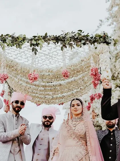 The bride's walk to the mandap is a cherished tradition. I design beautiful phoolon ki chaadar and coordinate the procession to create an emotional and visually stunning bridal entry.