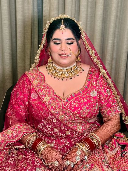 My beautiful bride Shrishti, glowing for her pheras. We chose a classic look with defined eyes and a soft lip color to perfectly match her vibrant pink lehenga.
