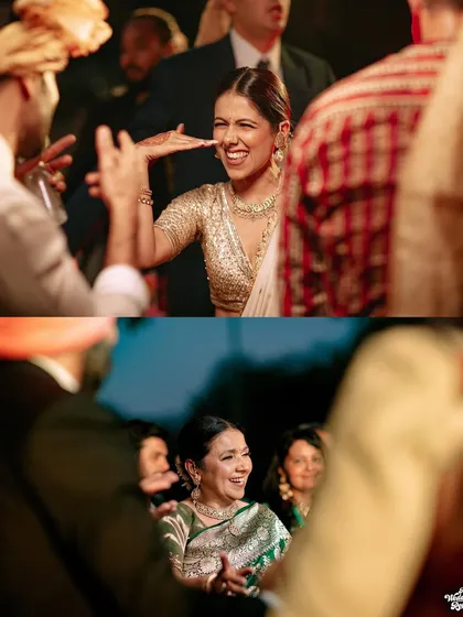 Candid moments of dancing and celebration at the wedding, capturing the joy of the family.