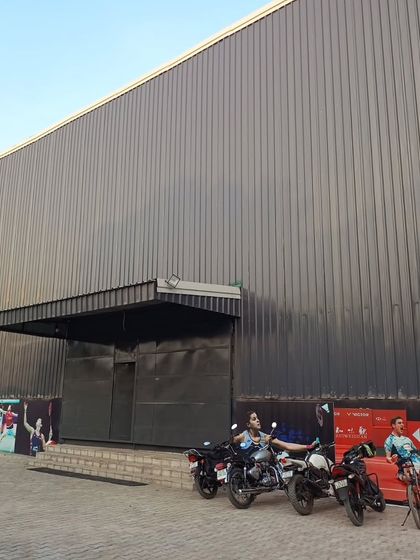 The impressive exterior of our new, modern sports facility in Ghaziabad. We provide ample parking and a professional environment from the moment you arrive.