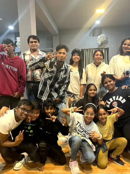 Another great shot with the participants from our dance workshop. Everyone is striking a pose, feeling proud and excited about the new dance form they just learned.