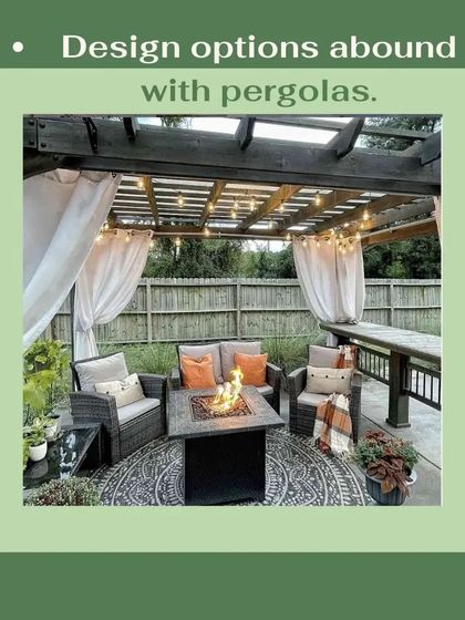 Pergolas offer endless design options. This cozy setup features a dark wood pergola with string lights and curtains, creating an intimate and inviting outdoor living room centered around a fire pit table.