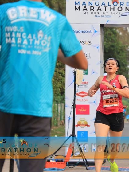 Neera Katwal - Running Coaching Coach on the Podium: Leading by Example photo 7