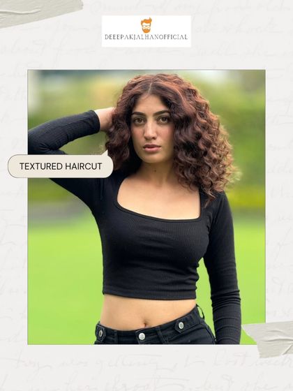 This textured haircut is a whole mood. It’s designed to make your natural curls the star of the show, adding volume and effortless shape.