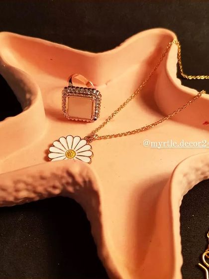 This peachy-pink starfish tray looks so lovely on a dressing table, keeping small items organized.