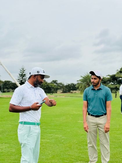 Our coaches are constantly on the range, providing hands-on instruction. From demonstrating a swing path to analyzing a student's setup, these moments of direct mentorship are where real progress is made.