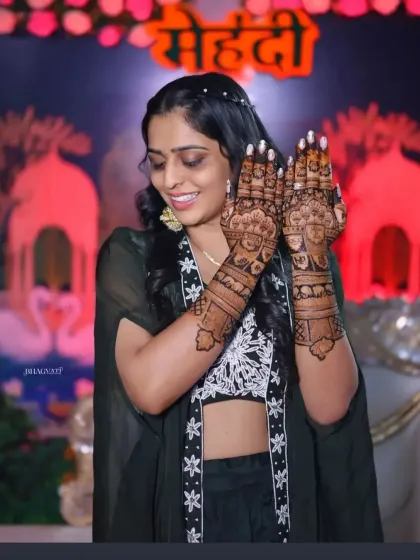 This bride is glowing as she displays her beautiful henna during her mehandi event.