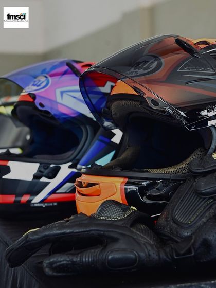 Gear up for glory. A lineup of helmets and gloves, essential safety equipment that we require for all our riders.