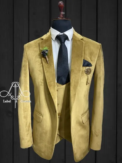 For your next special occasion, I've got you covered with this new velvet suit in a striking mustard yellow. The fabric gives it a rich, luxurious feel.