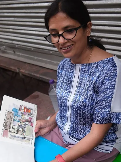 Here I am, happy with my sketch of the Jalebi Wala shop in Chandni Chowk. It's not about perfection, but capturing the gesture of the place.