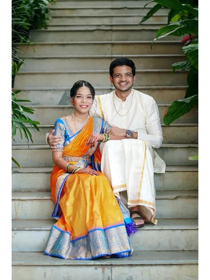 A relaxed portrait on the steps. This composition feels both elegant and informal, capturing the couple's personalities beautifully.
