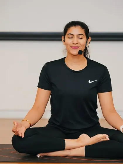 Finding calm in the chaos is essential for corporate life. I guide teams through mindfulness and meditation practices, like this seated session, to help reduce stress and improve mental clarity right at their desks.