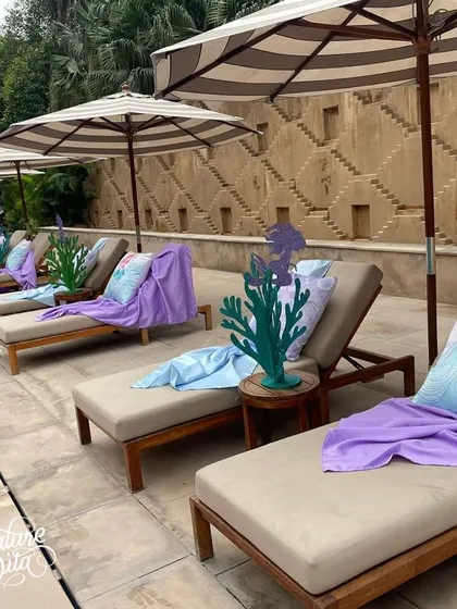 Even the poolside loungers were styled for the mermaid theme, with purple and blue throws and coral-shaped cutouts.