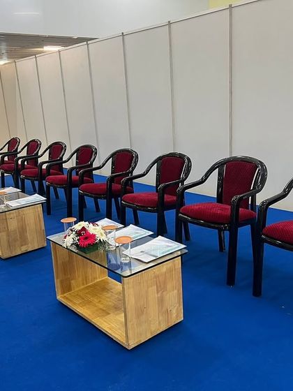 A simple yet professional setup for a BMRCL event at the JP Nagar Metro Station. This shows our capability to create event spaces within unconventional venues, complete with panel seating and floral arrangements.
