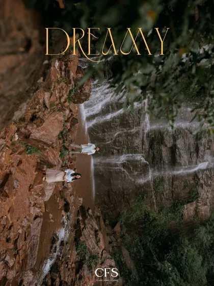 An artistic, rotated shot that uses the waterfall and cliffs to create a surreal, dreamy effect, perfect for a unique pre-wedding album cover.