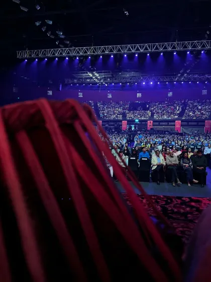 The view from behind the curtains at the NSCI Dome, looking out at the massive audience before a show with Rishab bhai.