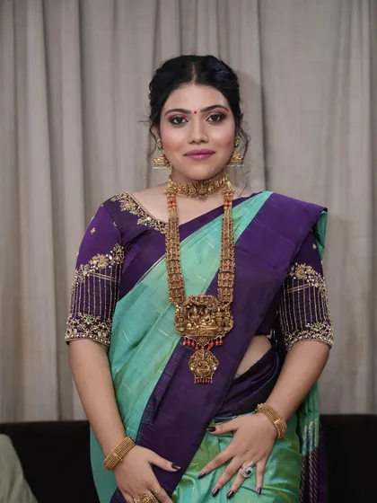 This bride is function-ready with a flawless glam look. The makeup is designed to be both beautiful and durable, perfect for a long day of celebrations.