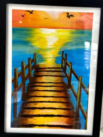 A vibrant sunset landscape painted with acrylics by one of our talented students.