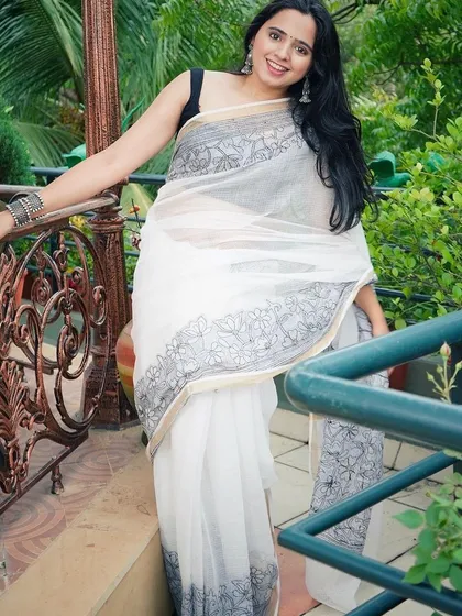 A model gracefully wearing the contemporary embroidered saree from Anorah, perfect for elegant daywear.