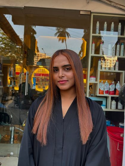 A beautiful, confident look. This copper brown shade brightens her features perfectly. Finding the right color is a conversation, but I will always guide you to a choice that I know will make you shine.