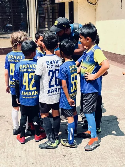 "Only the test of fire makes fine steel." A coach gives a pre-game talk to his young team.