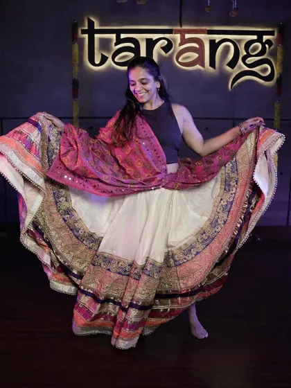 The twirl of a ghagra is essential to the beauty of Garba. I teach how to use costumes and props as part of the choreography to create a visually stunning performance.