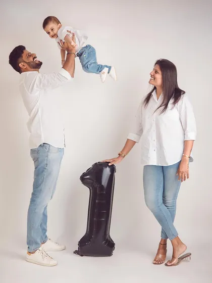 Celebrating a first birthday with pure happiness. Milestone photoshoots are a perfect way to mark these big moments, and we always make sure to get those playful, high-energy shots.