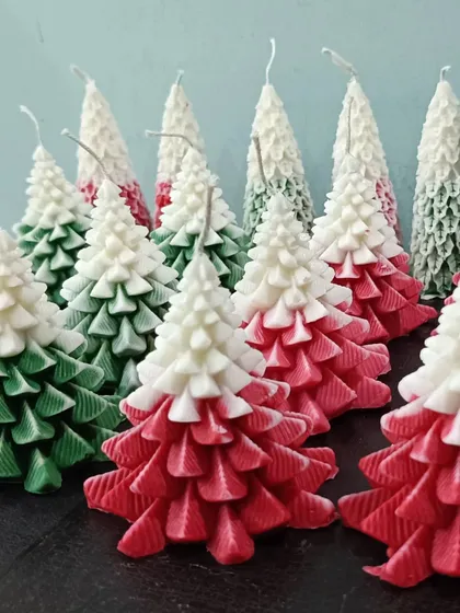 A batch of my ombre red and green Christmas tree candles, ready for holiday orders.