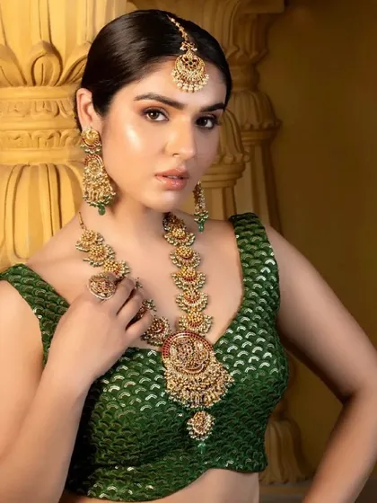 Here is another look from a temple jewellery campaign I styled. The long necklace, or 'haram', is a centerpiece of South Indian bridal wear. I paired it with a green brocade blouse to complement the traditional gold.