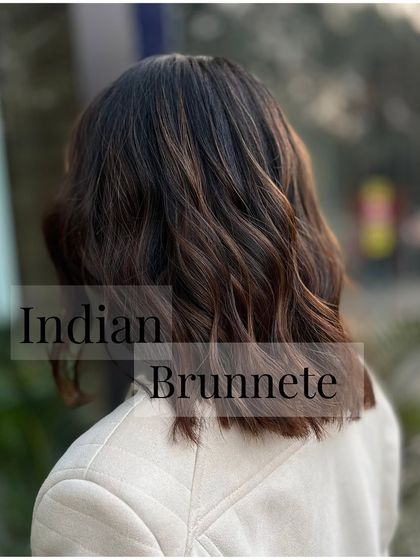A perfect example of an Indian Brunette shade achieved with a no-bleach transformation. The color is rich and natural, enhancing the hair's texture and shine.