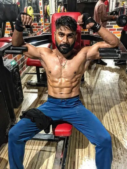 I'm showing you the results of my hard work. A lean and defined core is a sign of a disciplined lifestyle.