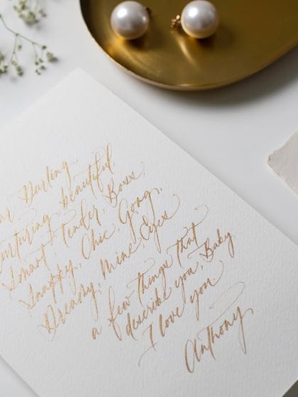 A love letter written in gold ink on handmade paper. Sometimes the most powerful gifts are simple words, beautifully written.