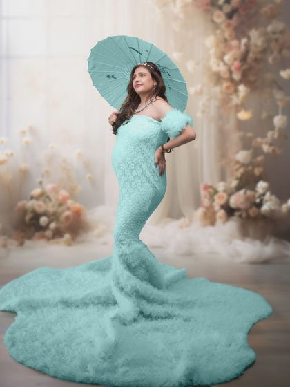 Unveiling a moment of pure enchantment. A serene turquoise gown meets a dreamy AI-generated background for a fairytale scene.