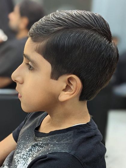 A super clean and sharp haircut for this young man. I take pride in giving kids stylish cuts that they love to show off.